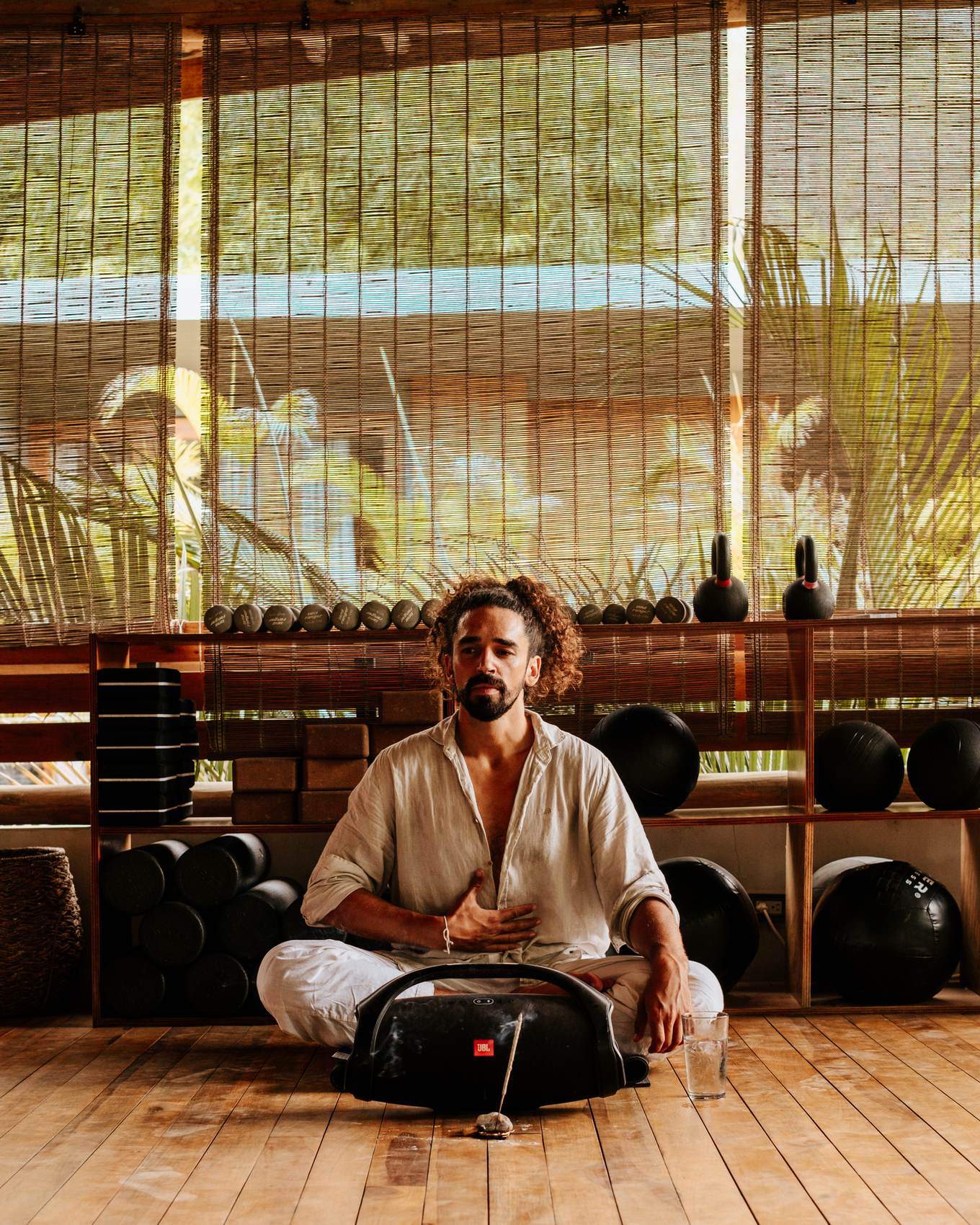 Mathias Philippe seated in stillness before a session, Santa Teresa