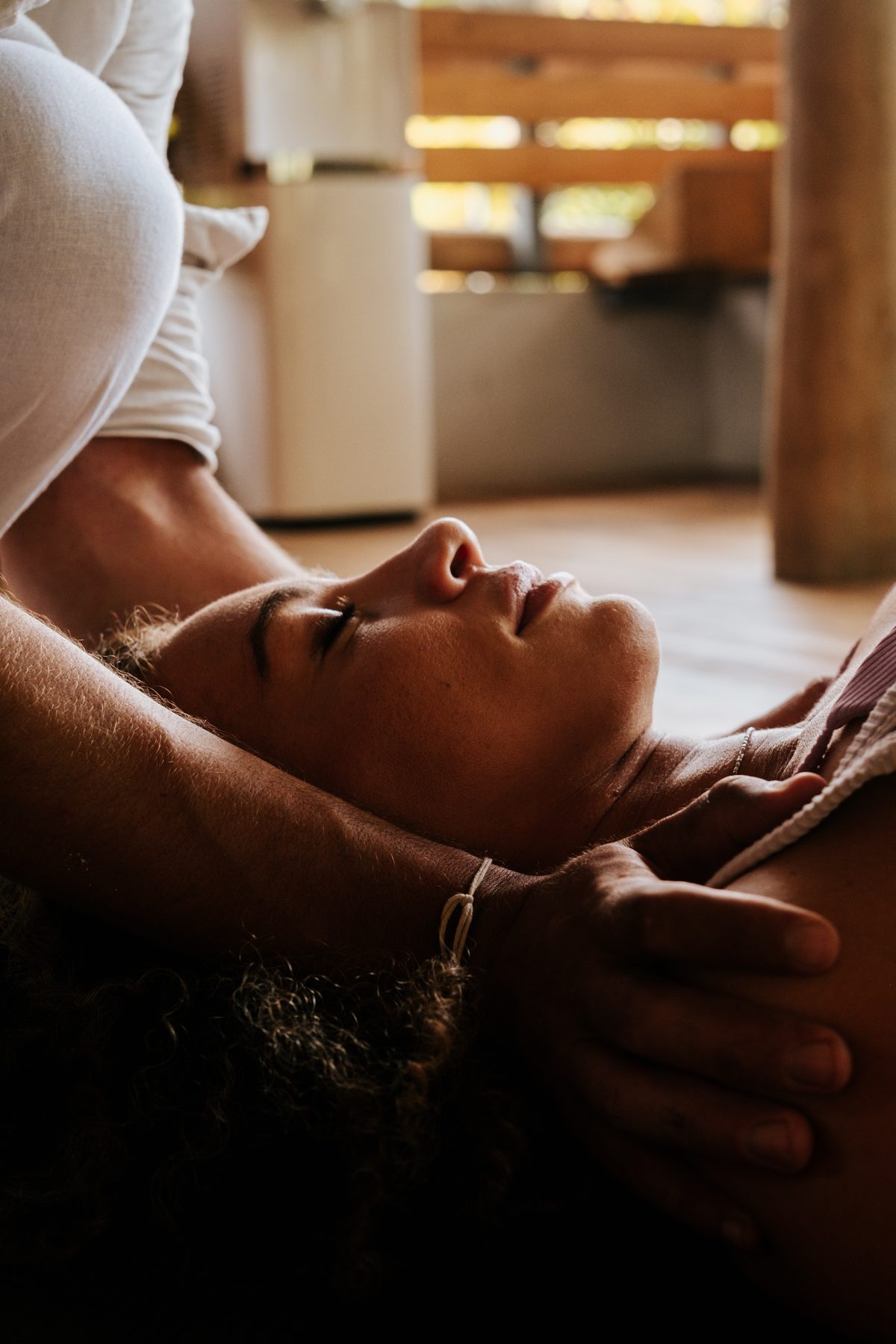 A client resting during a breathwork session